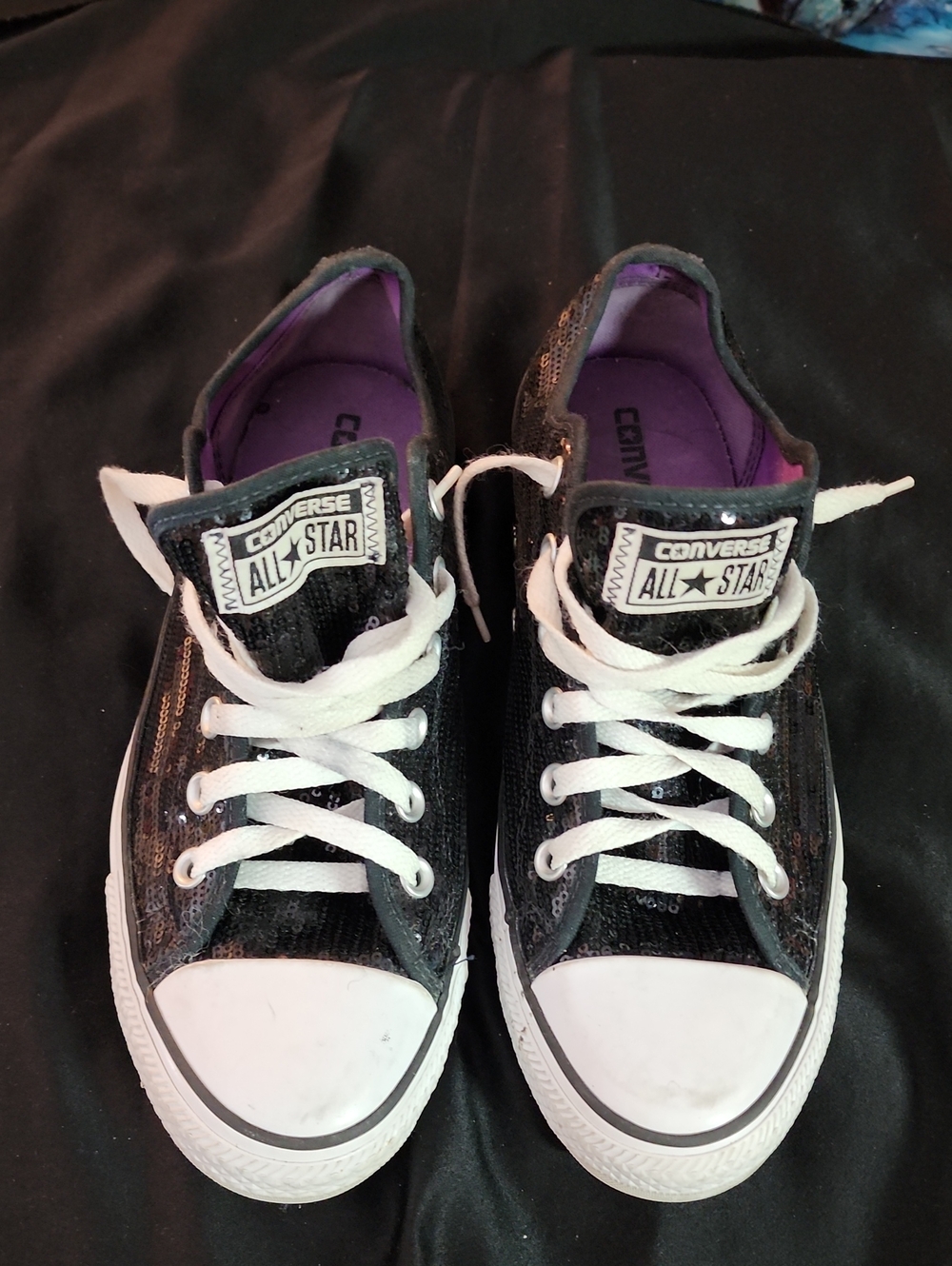 Converse Low Top Sneakers in Black with White Accents